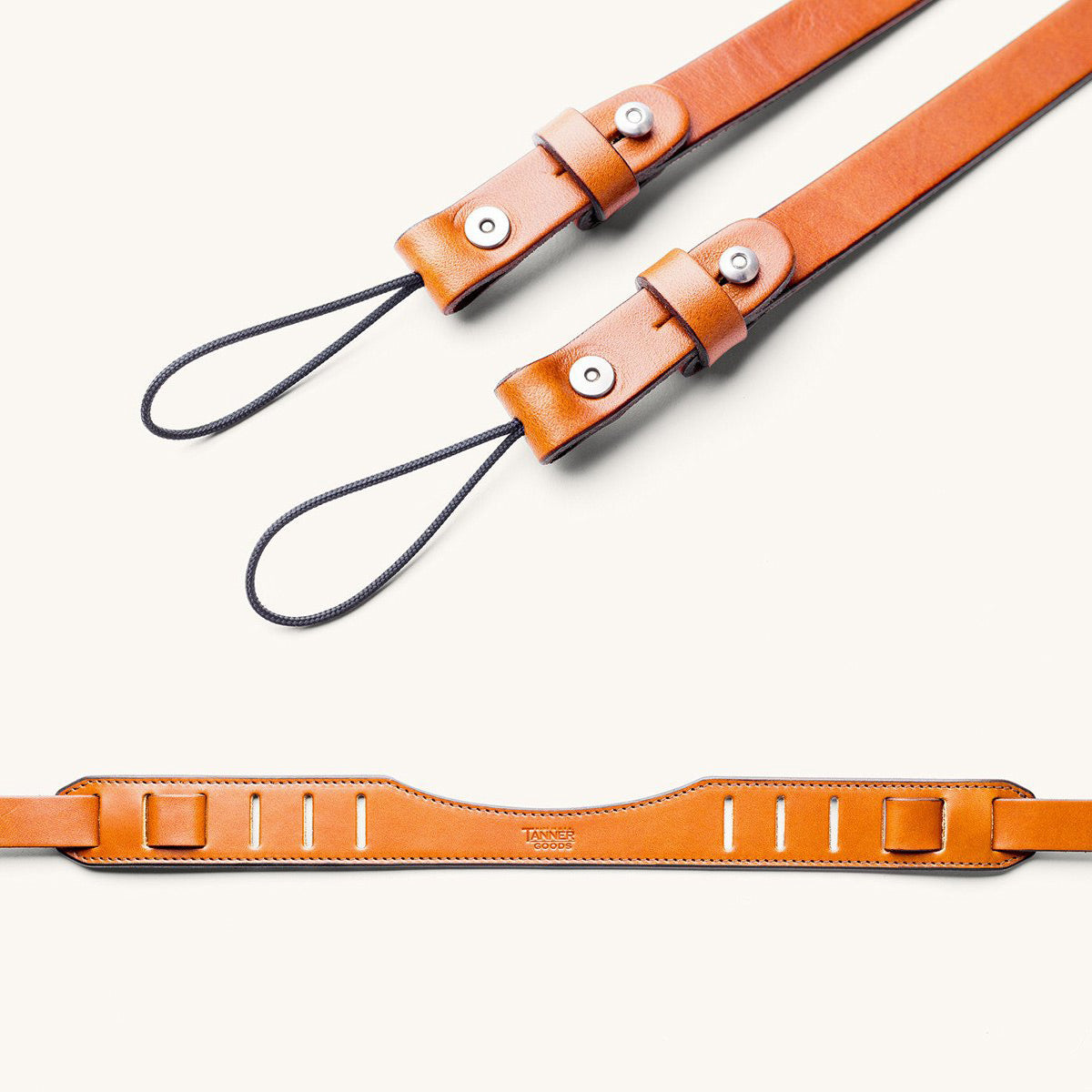 Two detailed shots of a black leather SLR camera strap.