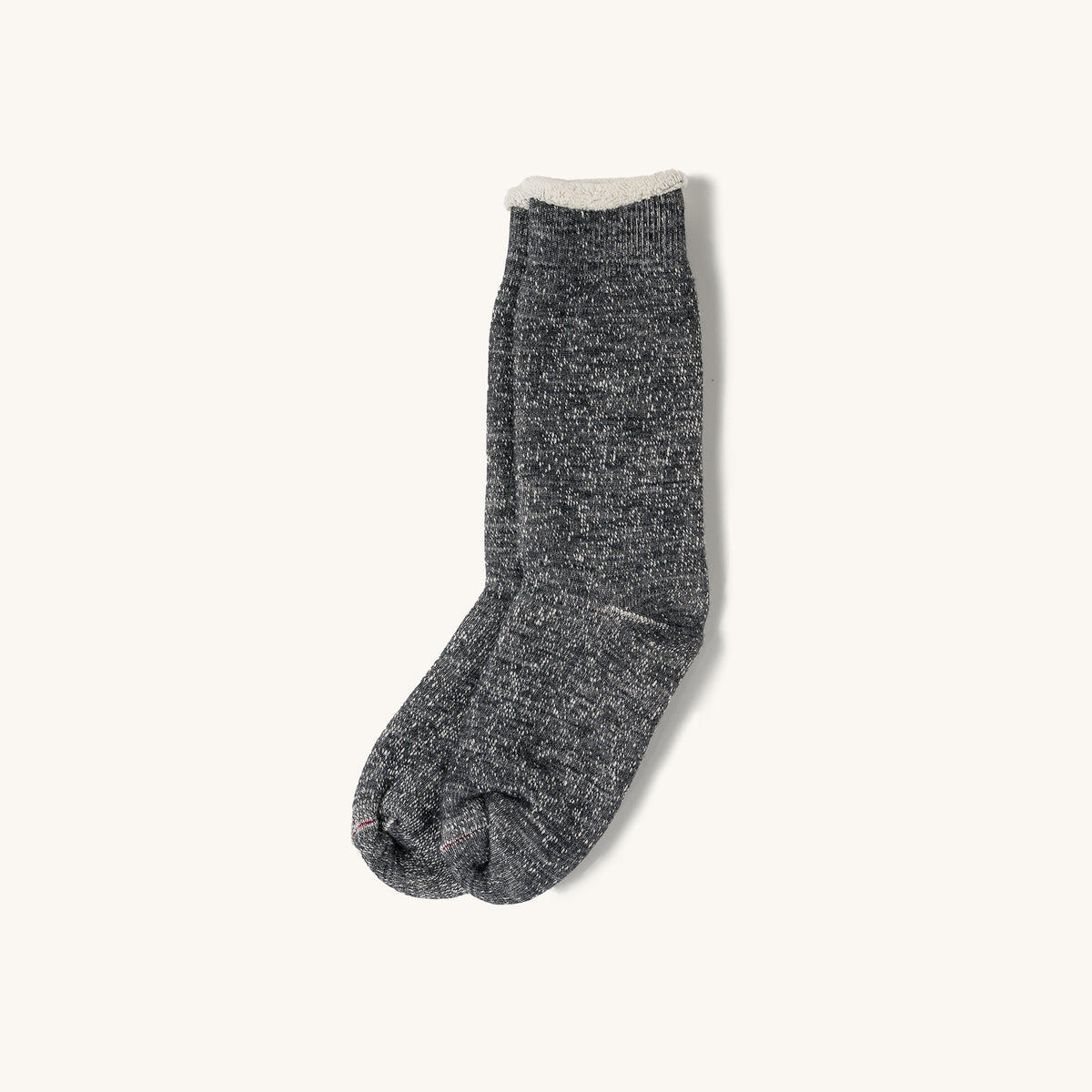 Charcoal double face crew socks with a marled knit texture and contrasting cream-colored cuff.