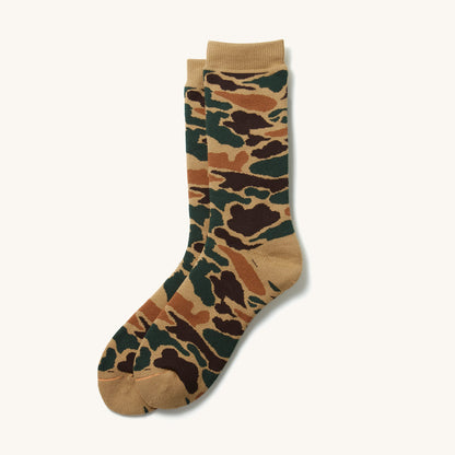Khaki pile camo crew socks with a classic woodland camouflage pattern in brown, dark green, and lighter tan.