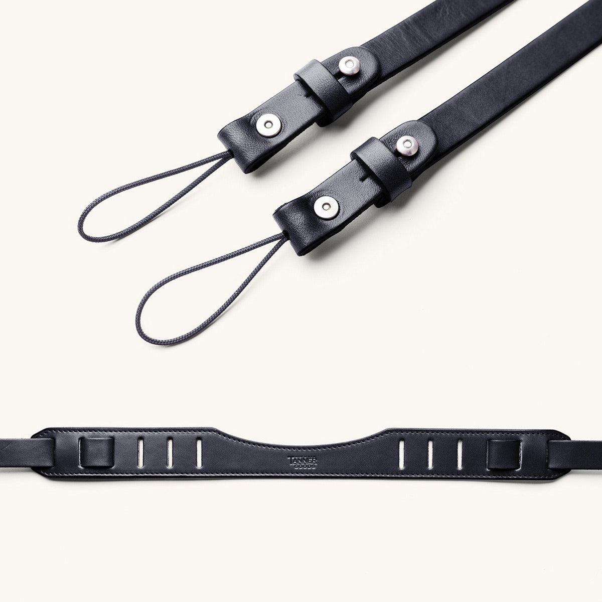 Two detailed shots of a black leather SLR camera strap.