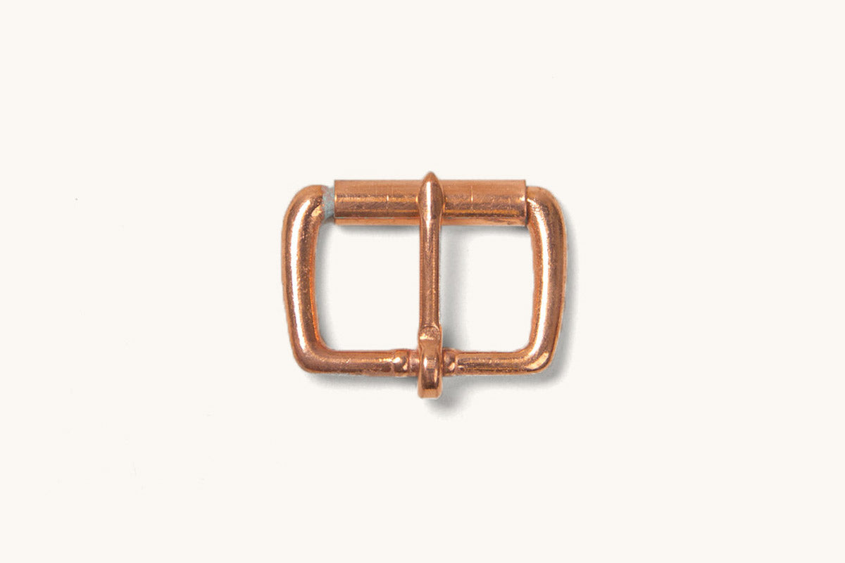 a copper belt buckle